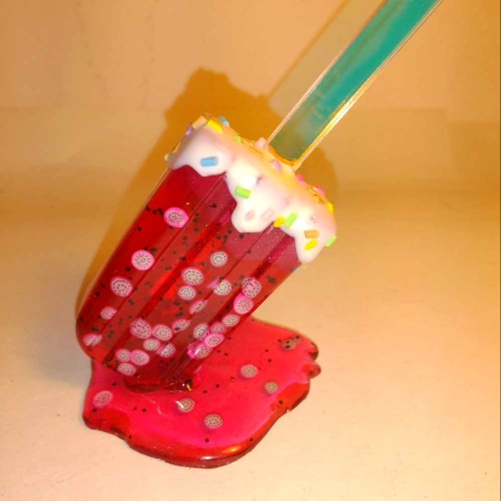 Homemade melting Popsicle. Glows
